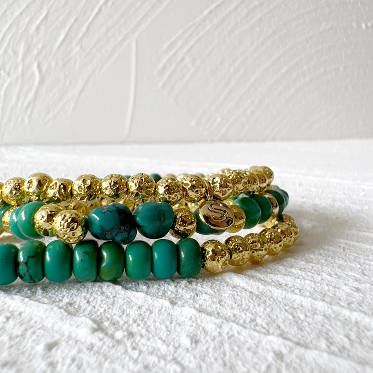 Turquoise, pierre de lave trempée dans de l'or 14 carats